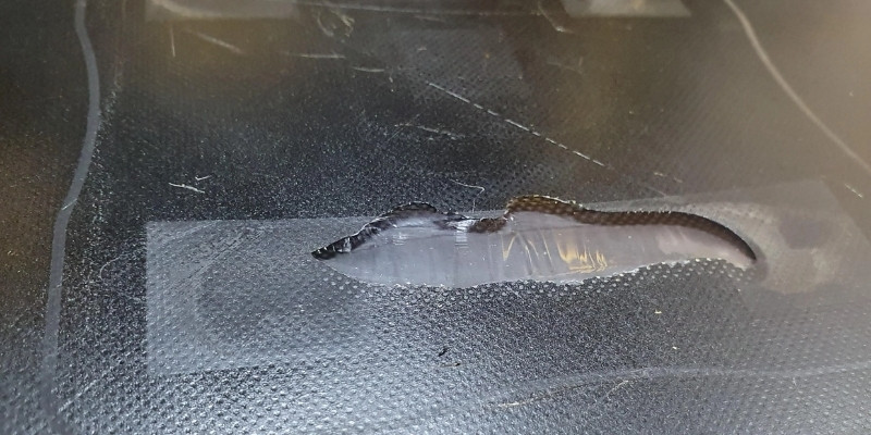 petg ripped off a chunk of the glass bed